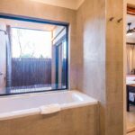 aha-Makalali-Main-Lodge-Superior-Room-Bath-and-Outdoor-Shower